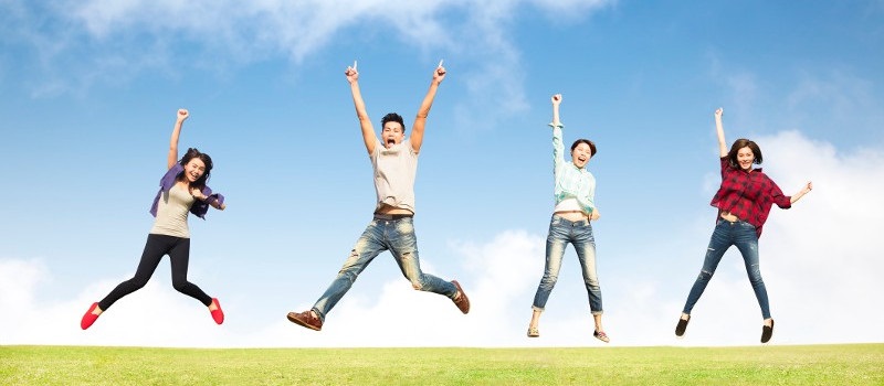 Young people jumping in air