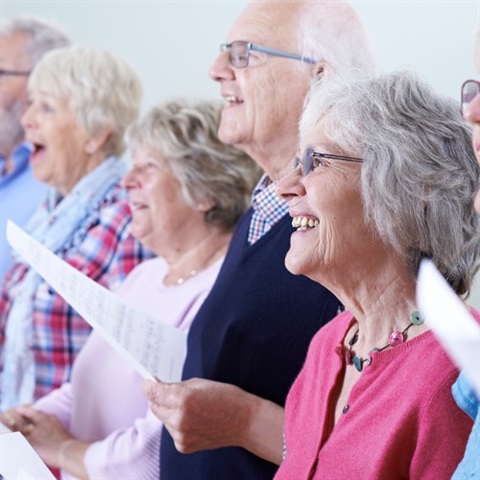 Group of seniors singing together